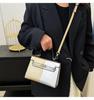 Color Block Kelly Bag: Trendy Two-Tone, Large Capacity, Versatile Shoulder & Crossbody Bag for Work Commute.