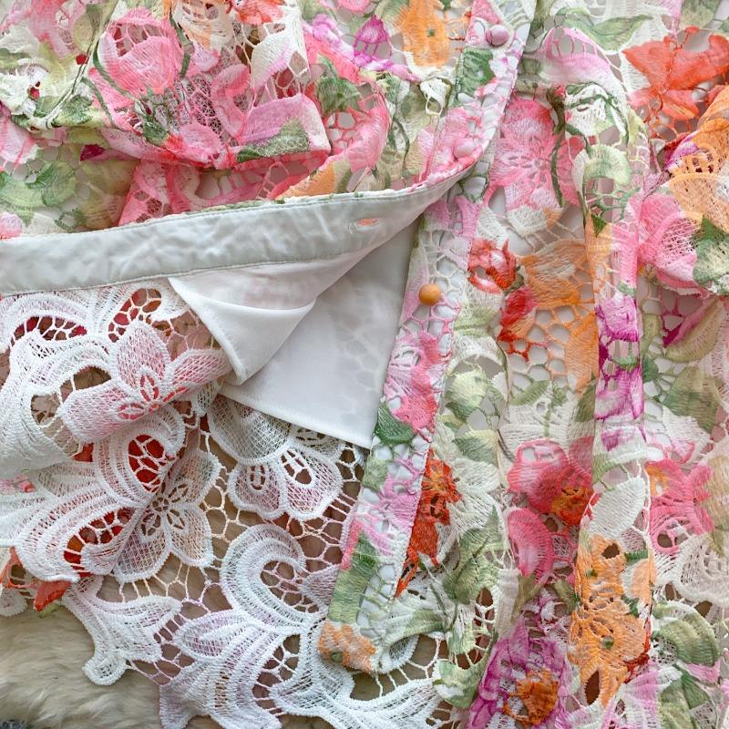 A Summer Women's Printed Dress with Flared Sleeves and Hollowed-out Crochet Design Featuring A Stylish Look