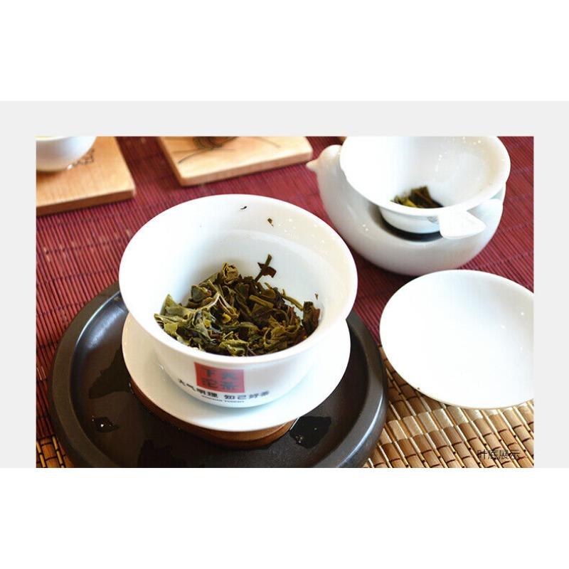 Qian Jia Zhai Xiaguan Wild Ancient Tree Yuan Cha Puerh Raw Pu'er Tea 357g