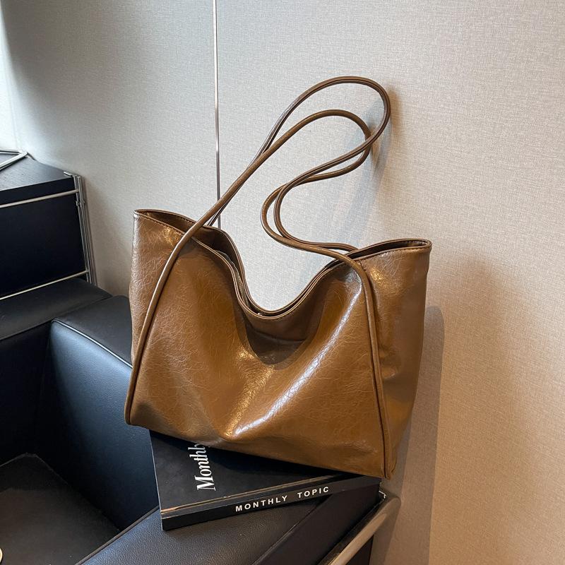 

Популярна цього року ретро сумка-месенджер жіноча 2024 нова універсальна великої місткості студентська класна сумка на плече коричневий