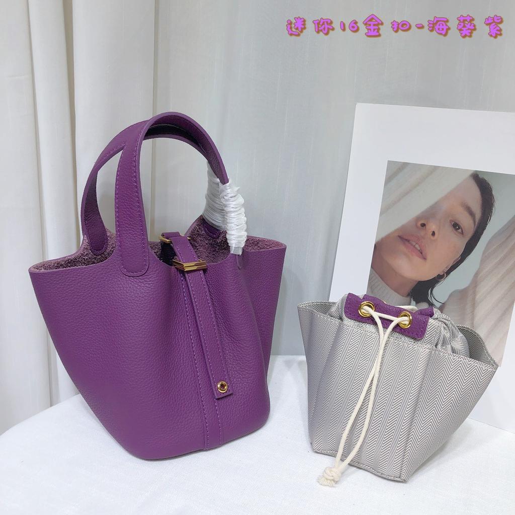 Spot wholesale top layer cowhide vegetable basket bag leather bucket bag commuter fashion lock buckle hand-held handbag woman