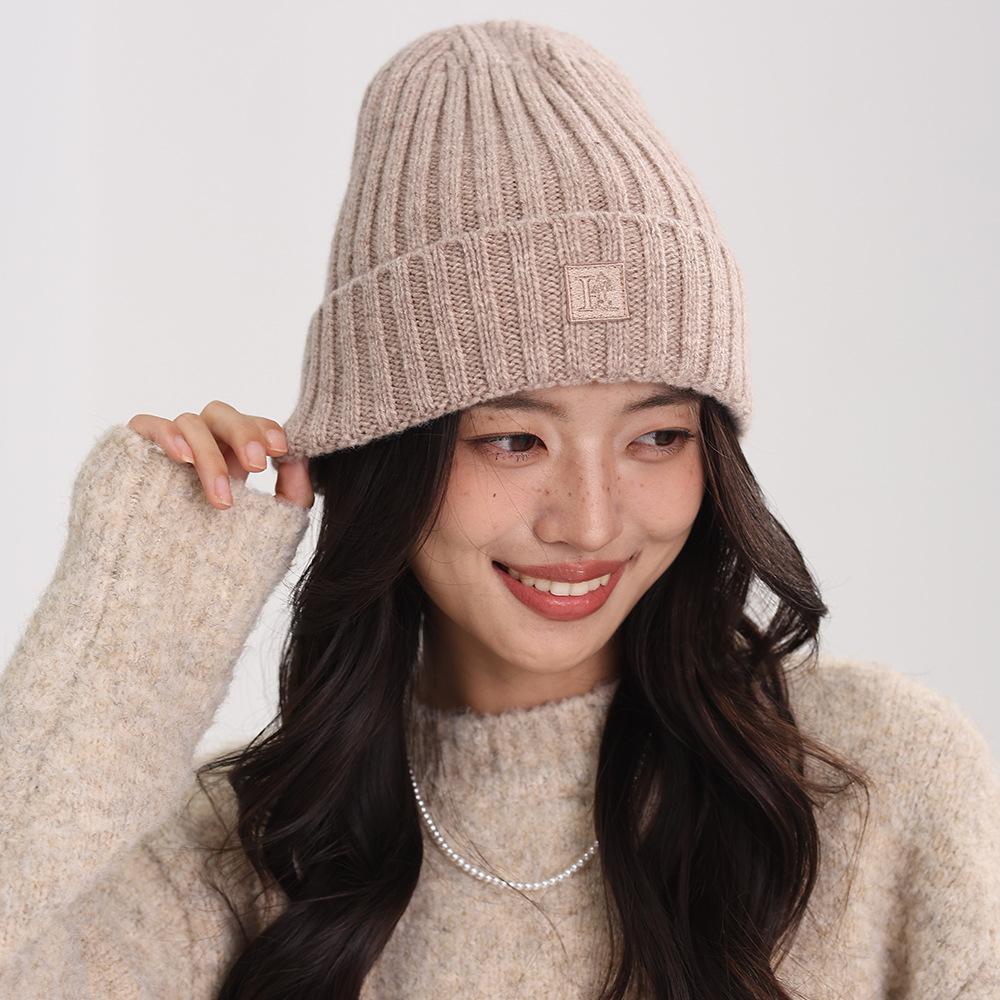 0% wool hat women's autumn and winter loose wool hat new warm advanced sense solid color crimping ear protector cold hat women