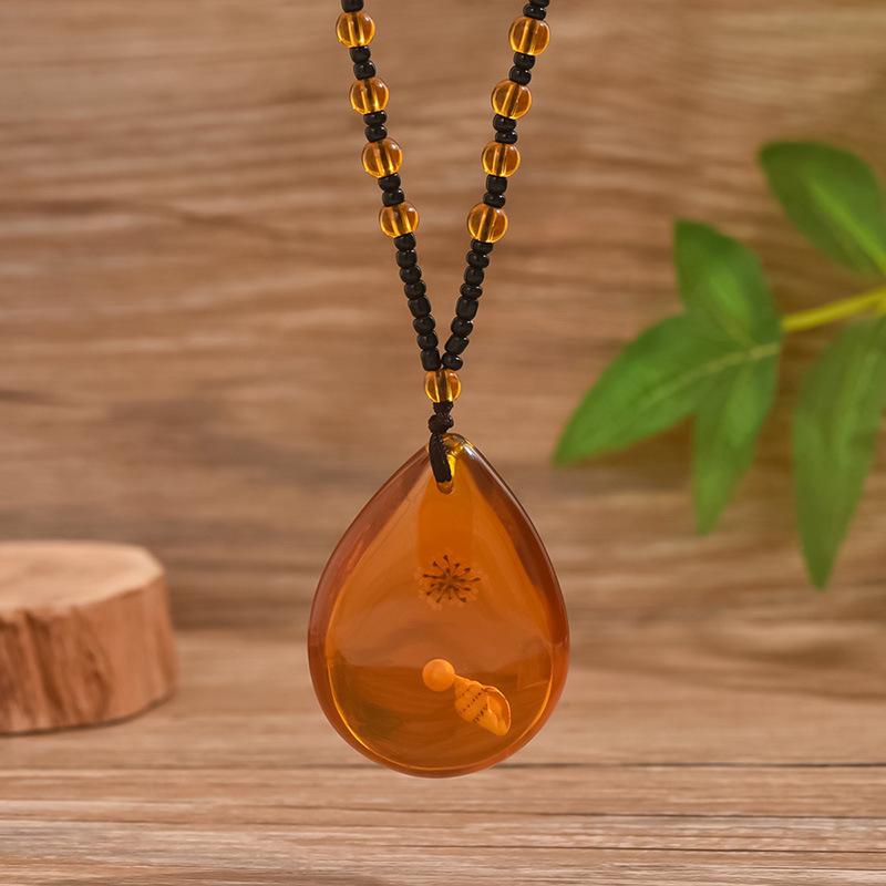 Elegant Translucent Conch Flower Pearl Water Drop Pendant - New Chinese Style.