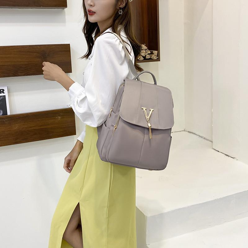 

IELGY Женский черный рюкзак из ткани Оксфорд с защитой от брызг, корейская версия модной вместительной женской деловой дорожной сумки хаки