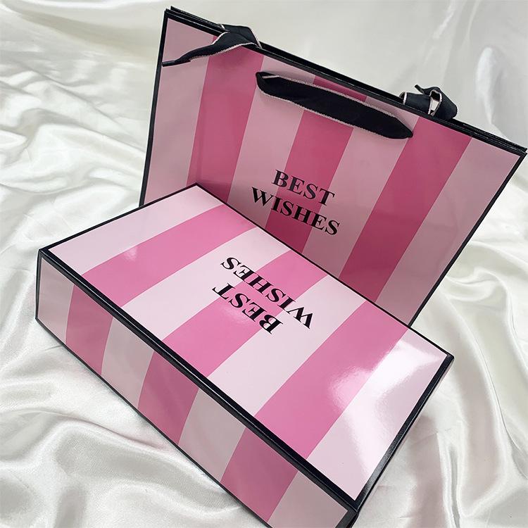 

розовая подарочная сумка-тоут, элитное нижнее белье, бюстгальтер, подарочная коробка, подарочная упаковочная коробка, сумка-тоут. розовый