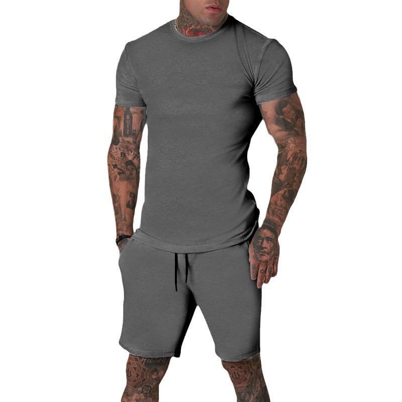 Conjunto de Camiseta de Manga Corta y Pantalones Cortos de Color Sólido para Hombre de Verano - Transpirable y Elegante.