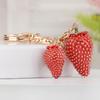 Rhinestone Strawberry Keychain: Cute Fruit Bag Charm & Light Luxury Metal Pendant for Women’s Car Keys