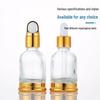 Auf Lager Goldene Basis Ätherische Öl Flasche - Transparente Glas Serum Flasche mit Gummi Kopf Tropfer, Versiegelte Leere Kosmetik Probe Flasche.