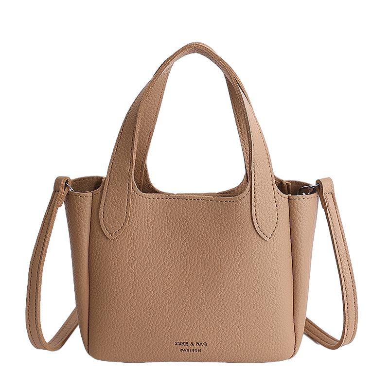 

Advanced Handheld Bucket Bag Women 2026 New Retro Lychee Pattern Mother Child Versatile Simple Single Shoulder Crossbody