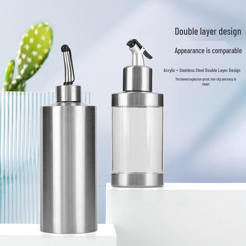 Cylindrical Stainless Steel Seasoning Bottles: Transparent Oil, Soy Sauce, and Vinegar Containers for the Kitchen.