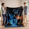 A Futuristic Armored Figure with a Gun Dominates a Crime Action Scene. for All Seasons Blanket Lunch Break Throw Gift