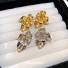 Silver Needle Cold Wind Niche Retro Metal Flower Stud Earrings Design Sense Earrings Simple Fashion High Sense Earrings Women