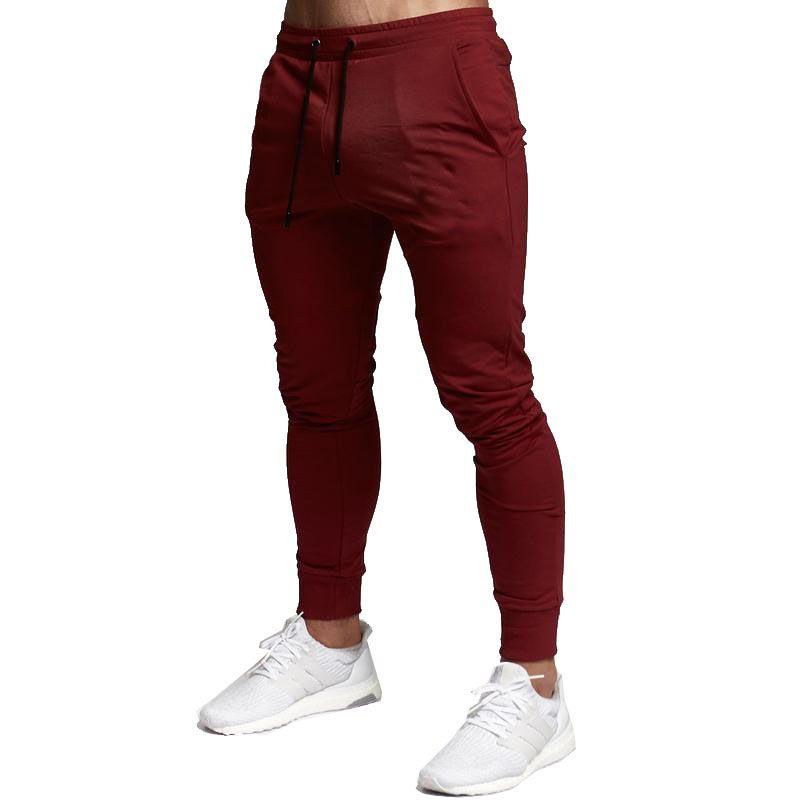 Men's Jogger Trousers Made From Soft Material With Adjustable Waist And Side Pockets