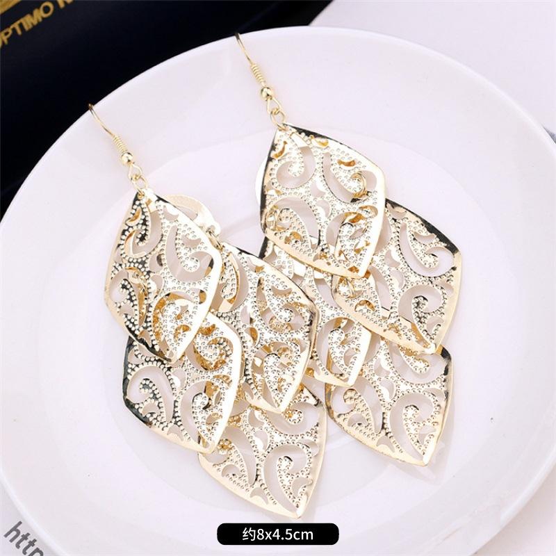 Fashion exaggerated niche temperament fringed earrings retro personality versatile sequined earrings women's long ear jewelry