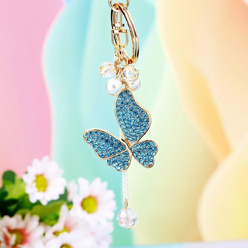 Cute Pearl Adorned Keychain With Vibrant Butterfly Design Ideal For Gift Giving Occasions