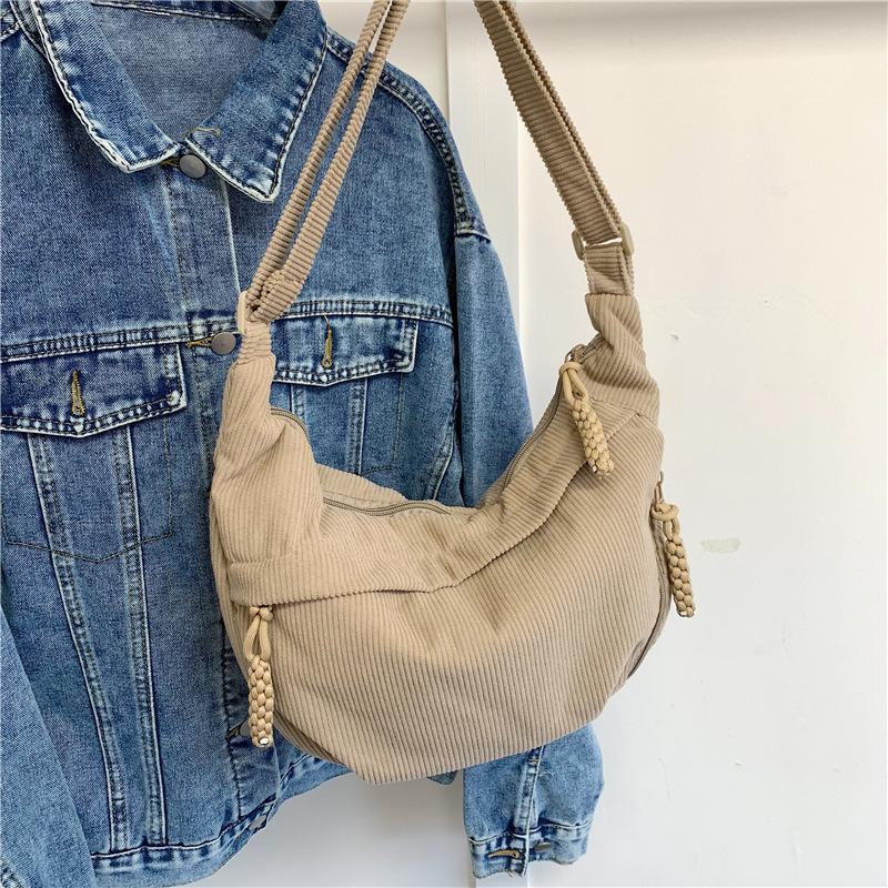 Spring new simple large-capacity messenger bag female student small satchel sports versatile backpack dumpling bag