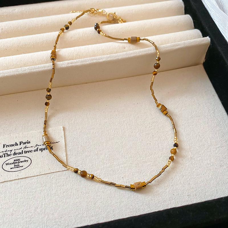 Titanium Steel Sun Necklace with Natural Stone Rice Beads - Retro Ethnic Clavicle Chain, Light Luxury Fashion Accessory