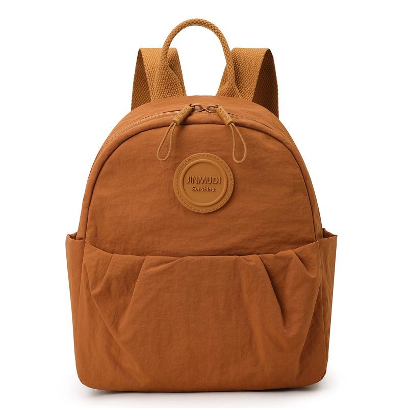 

Lightweight Waterproof Nylon Bag Pleated Commuter Backpack Solid Color Women Backpack помаранчевий