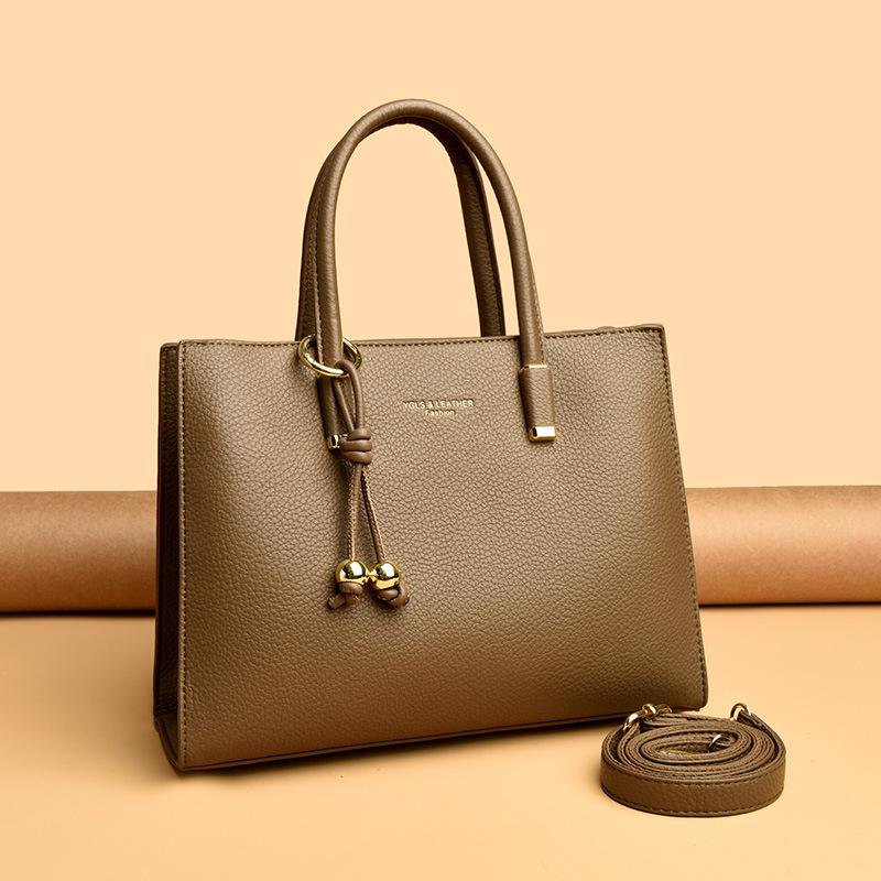 

New autumn and winter fashionable large-capacity simple briefcase portable oblique span retro women s bag tote bag shoulder bag