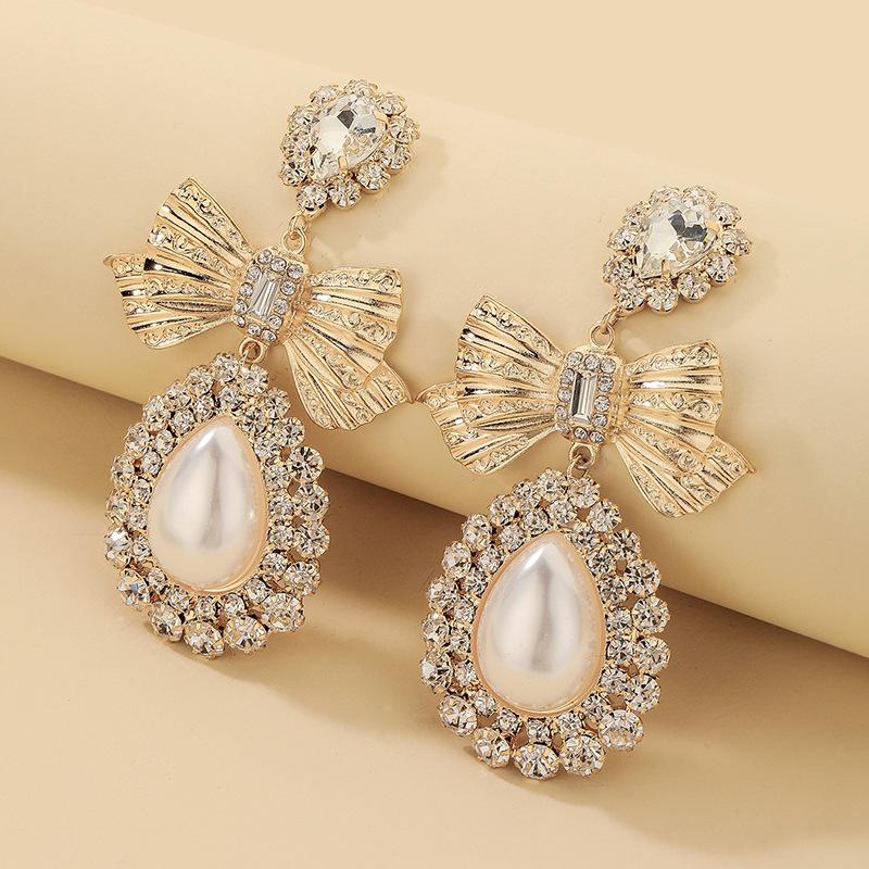 Серьги-пусеты с имитацией жемчуга и бриллиантами в форме банта, серьги с серебряной иглой в форме капли, персонализированные серьги.