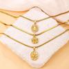 18k Gold-Plated Titanium Steel Necklace with Inlaid Diamond Flower Pendant