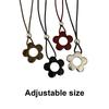 Delicate Long Leather Cord Necklace with Intricate Flower Charm Ideal for Fashion Forward Women Seeking Unique Accessories