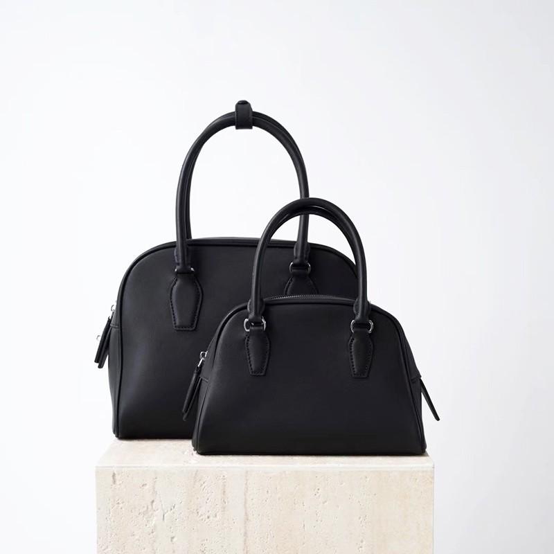 

Трансграничная высококачественная коровья кожа высшего слоя Индия Защитная сумка для мячей Большой вместимости Дышащая Ручная Одинарная кожаная сумка игрока поло Женская 20x14x8cm чёрный