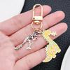 Cute Yellow Dinosaur Keychain: Creative Cartoony Bag and Car Accessory