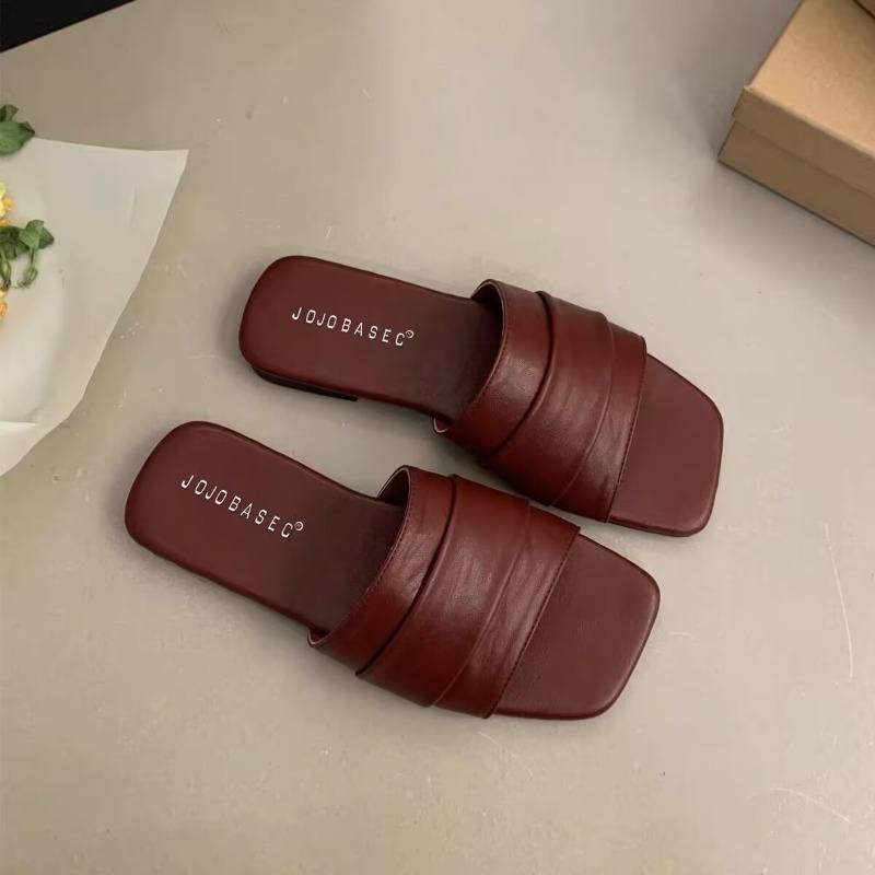 Folded soft leather slippers for women to wear summer soft flat-bottomed seaside vacation beach shoes one-word sandals