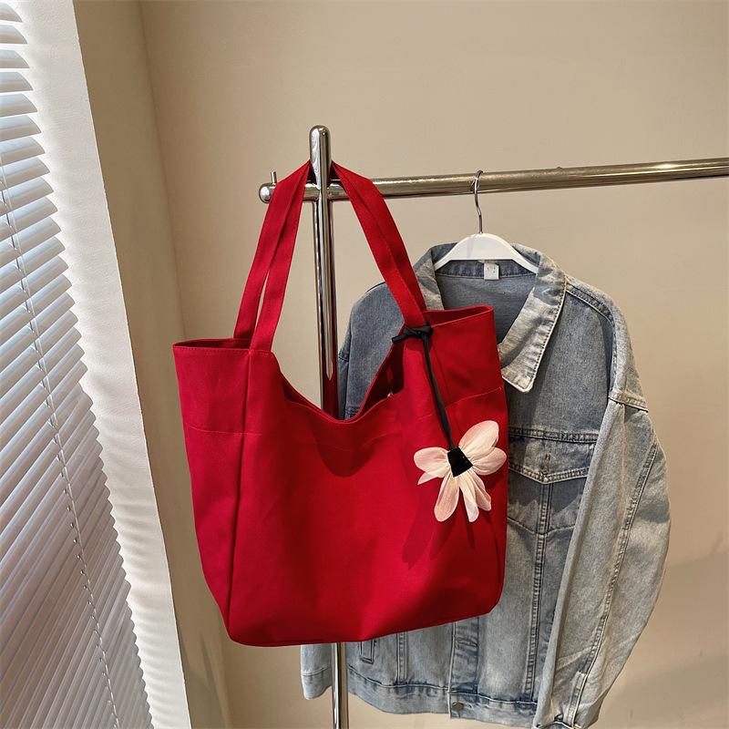 

2025 весна новая корейская версия повседневная простая сумка-тоут большой вместимости легкая для поездок на работу ленивый ветер на плечо женская сумка красный