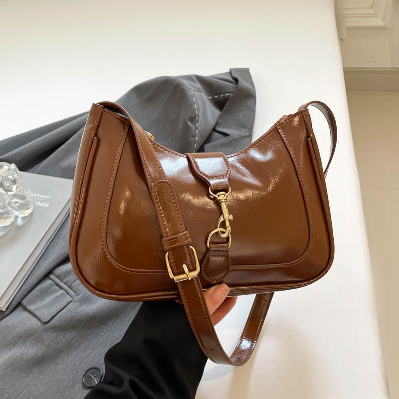 

2025 summer new armpit saddle bag women s handbag bag niche high-value women s bag trendy shoulder bag bag коричневый