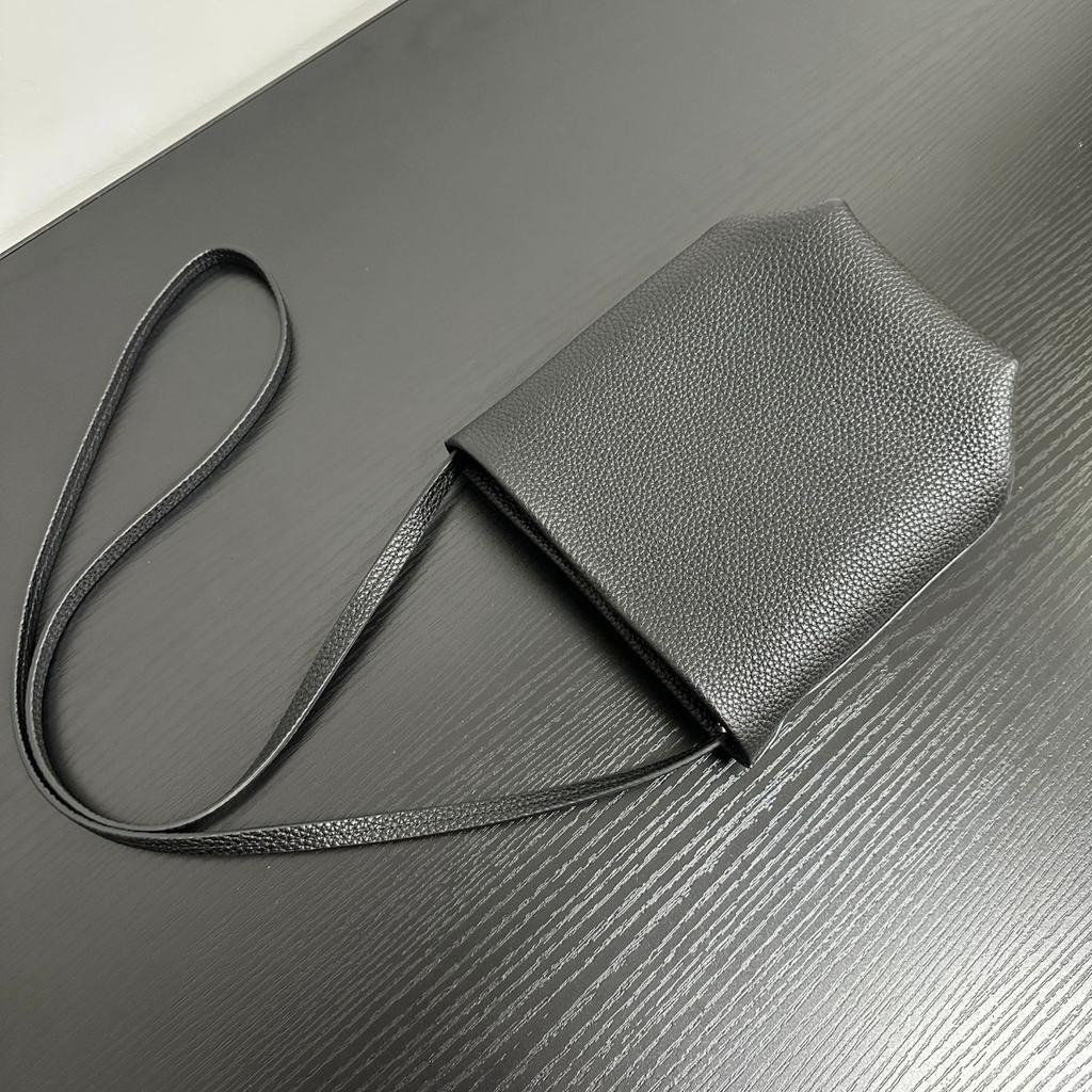 Row wind niche imported first-layer cowhide commuter mini bucket bag minimalist wind shoulder portable oblique span mobile phone bag