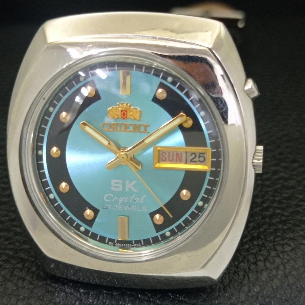 JAPAN VINTAGE ORIENT SK CRYSTAL AUTOMATIC MENS SKY BLUE DIAL WATCH a703412-1
