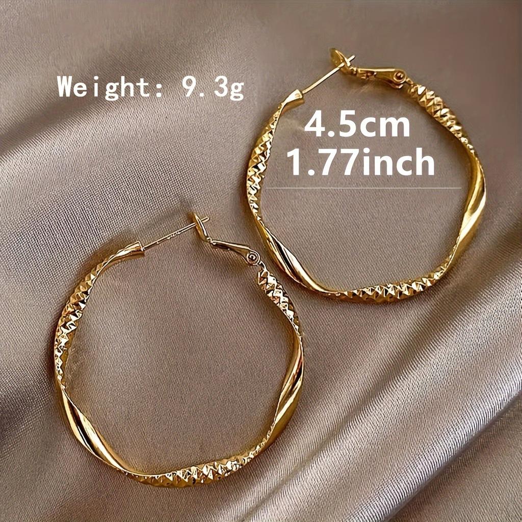 Fashionable and simple round twisted irregular ladies earrings exaggerated girls earrings high-grade plain hoop earrings