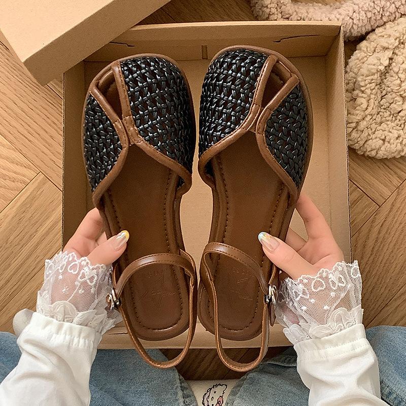 Small foot skirt with bag head, hole shoes, sandals, women's summer belt 2025 flat bottom one word niche shoes retro