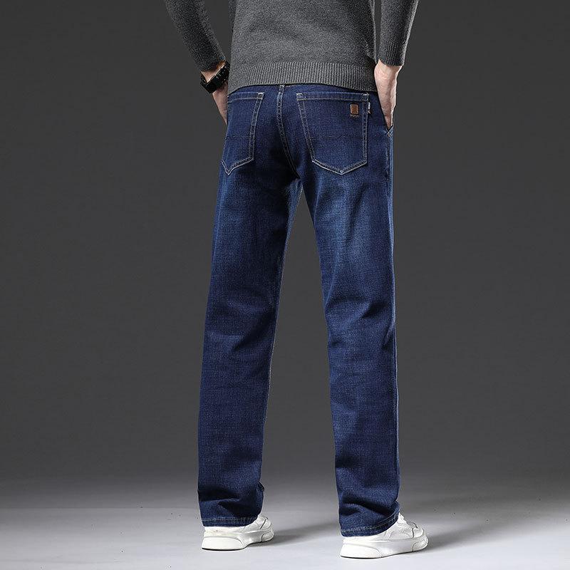 Autumn and winter men's loose straight jeans elastic business trend youth casual long pants for men