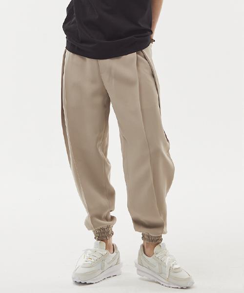 SEVENSELAH Hubis Transform Double Pleated Jogger Slacks Beige