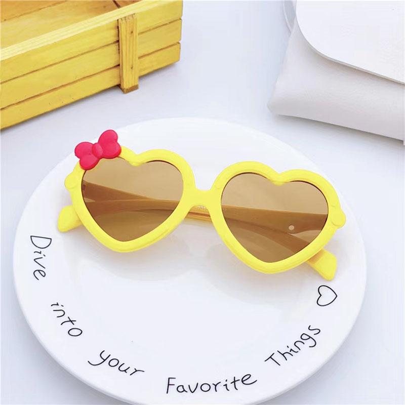 Neue Kinder-Sonnenbrille in Herzform Mädchen-Dekorative Schleife Sonnenbrille Niedliche Baby-Outdoor-Sonnenblende Brillen UV400