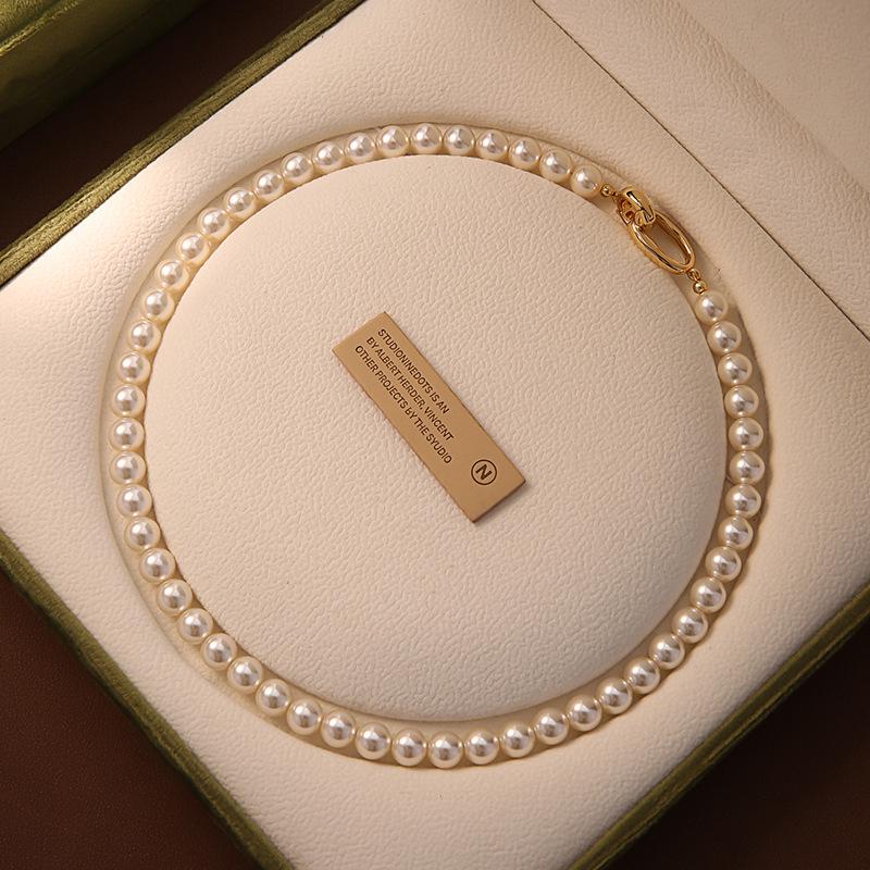 

Niche Korean-Style Pearl Choker Necklace: Strong Luster Imitation Pearls for Women