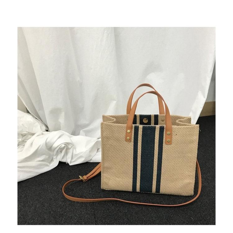 Korean-Style Striped Canvas Shoulder Bag: Women's Minimalist Professional Handbag with Large Capacity.
