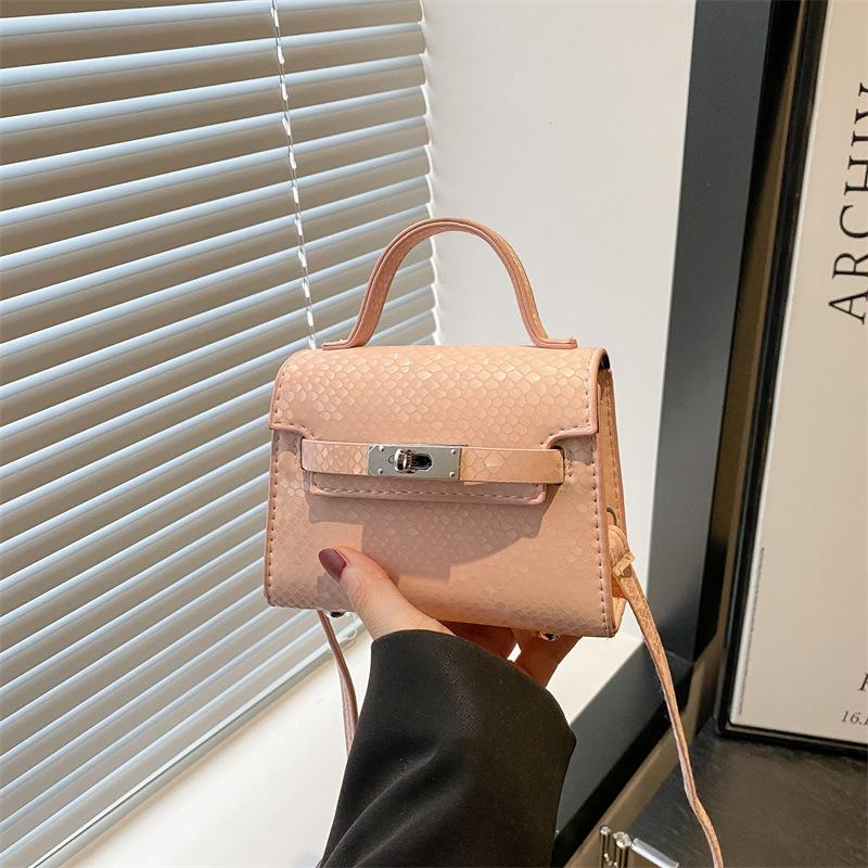 

New fashionable and exquisite mini solid color high-end texture temperament portable shoulder messenger bag women s bag рожевий
