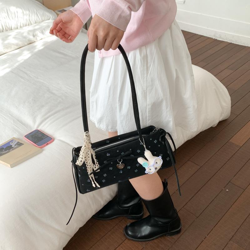 Spring and summer niche printed bag women s new commuter versatile shoulder underarm bag fashionable portable baguette bag