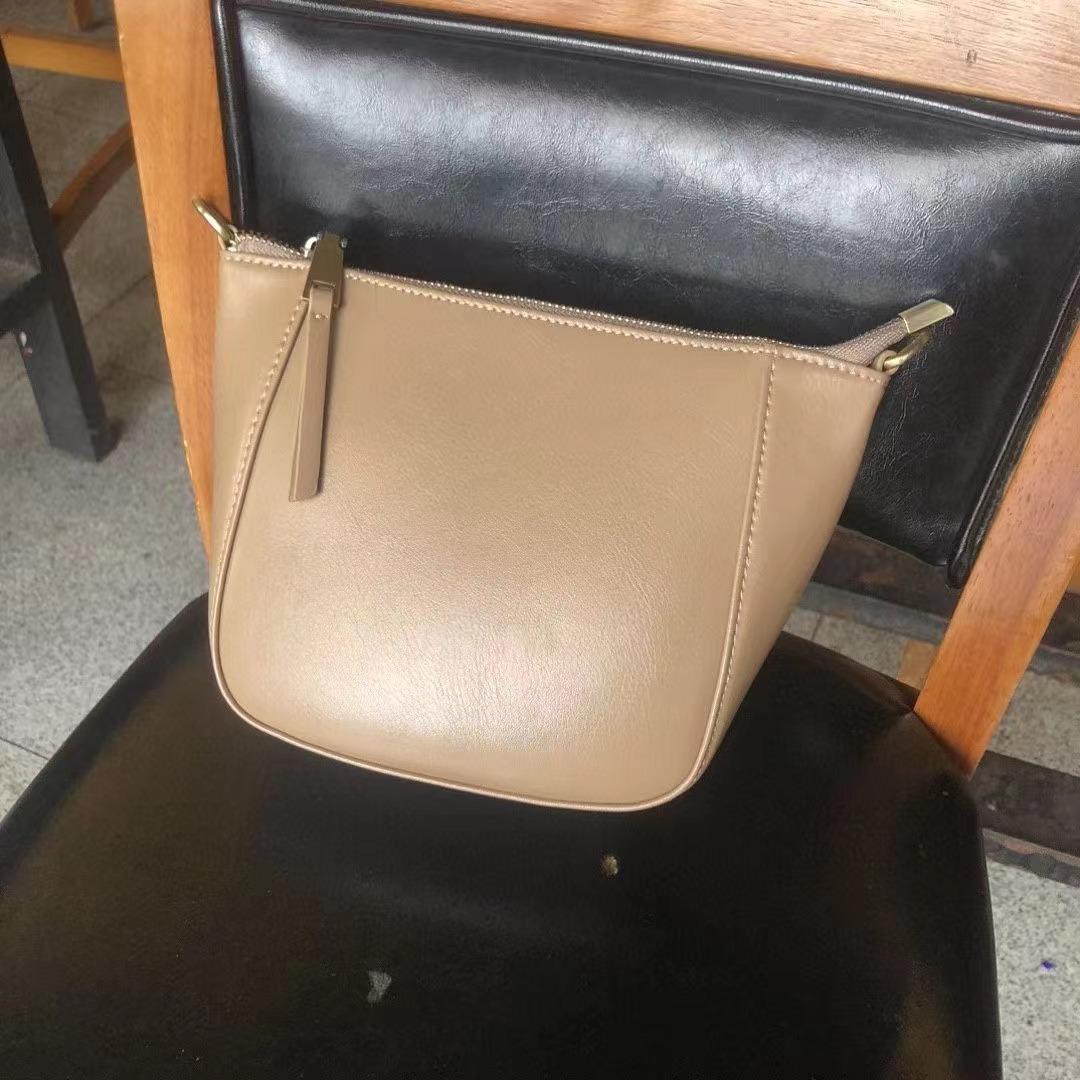 

Женская весенняя новая сумка из кожи растительного дубления, высококлассная, универсальная, нишевая маленькая сумка, кожаная наплечная сумка-мессенджер 40cm*10cm*40cm абрикосовый