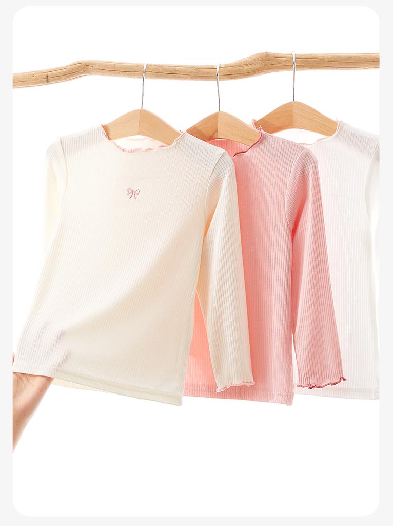 T-shirt da bambina 2026 nuovo stile per neonate, assorbente l'umidità, traspirante, carina, tinta unita, con pizzo, a maniche lunghe, maglia intima per bambini