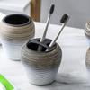 Badezimmer-Zubehör-Set mit Zahnbürstenbecher Mundspülbecher Lotionflaschen Seifenschale