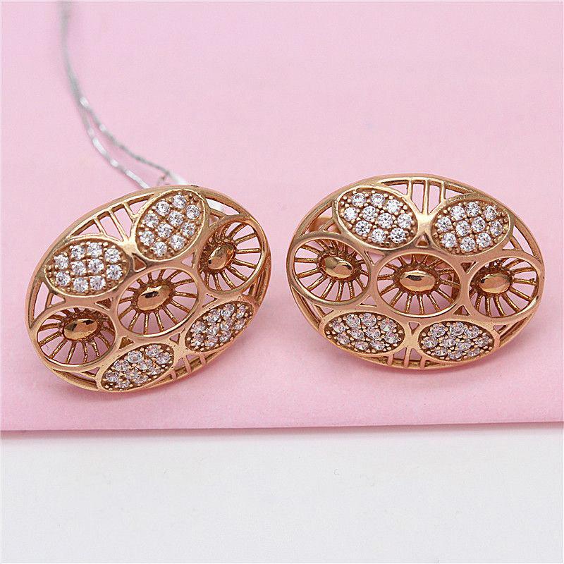 Exquisite Russian Purple Gold Luxury Oval Zircon Earrings Fashionable European And American Rose Gold Plated Hollow Flower Ear Buckles (rose gold plated pair)
