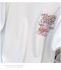 Women's Plus Size Loose Fit Mid-Length Round Neck T-Shirt with Short Sleeves and Slimming Design.