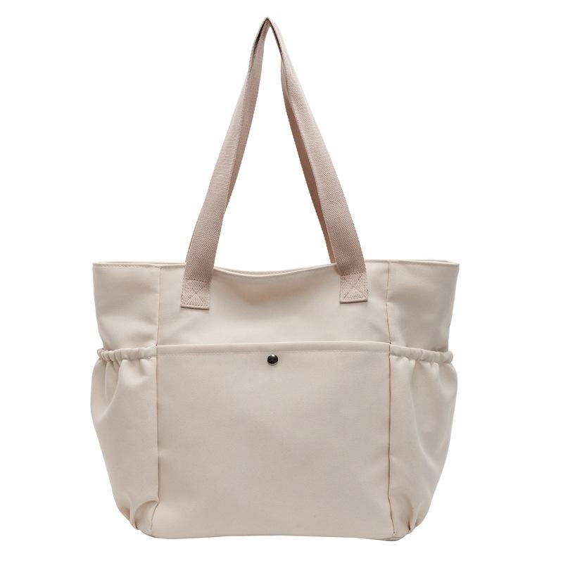 Simple canvas bag Women's tote bag Large capacity commuting Simple leisure College student work Shoulder bag Underarm bag