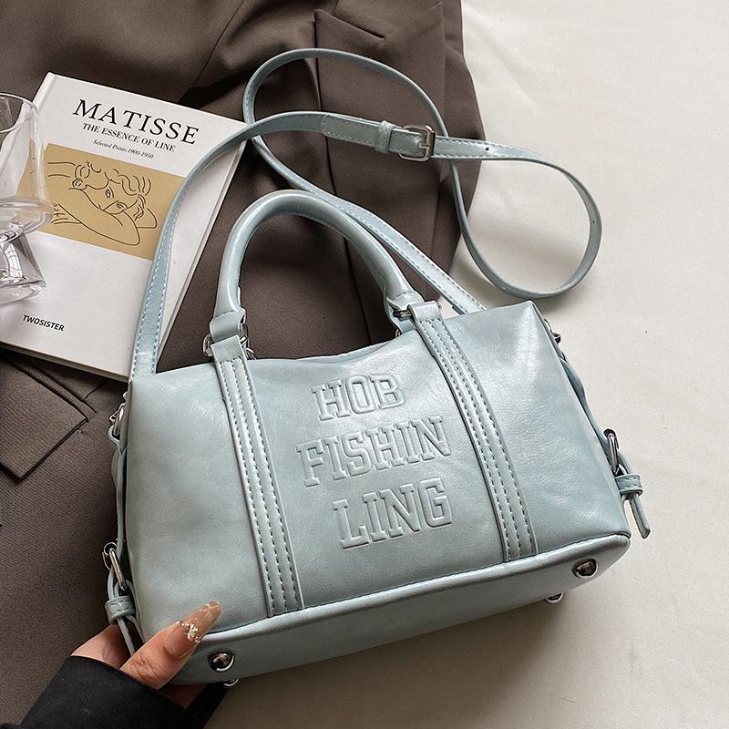 

Popular hot-selling Korean version retro simple soft leather portable bowling bag women s niche casual versatile foreign style messenger bag