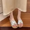 French flat-bottomed slippers women's summer wear 2025 new Internet celebrity fashion retro woven soft bottom word beach sandals